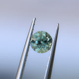 0.85CT ROUND PRECISION CUT MONTANA SAPPHIRE, LIGHT GREEN YELLOW, 5.55X3.70MM