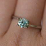 0.85CT ROUND PRECISION CUT MONTANA SAPPHIRE, LIGHT GREEN YELLOW, 5.55X3.70MM