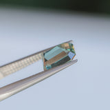 2.26CT MADAGASCAR EMERALD CUT SAPPHIRE, GLASSY GREEN GREY, 8.6X6.2X4.6MM