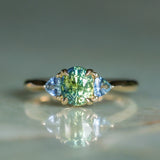 1.61ct Oval Madagascar Parti Sapphire and Trillion Sapphire Three Stone Low Profile Ring in 14k Yellow Gold