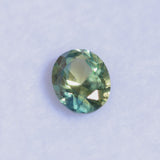 0.65CT OVAL AUSTRALIAN SAPPHIRE, PARTI LIGHT GREEN YELLOW BLUE, UNTREATED, 5.70X4.60X3.30MM