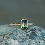 1.11ct Elongated Cushion Australian Parti Sapphire Low Profile Bezel Solitaire Ring with Pavé Set Diamonds in 14k Yellow Gold