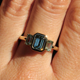 1.29ct Bezel Set Emerald Cut Untreated Montana Sapphire and Montana Sapphire Sides Three Stone Ring in 14k Yellow Gold