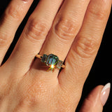 1.29ct Bezel Set Emerald Cut Untreated Montana Sapphire and Montana Sapphire Sides Three Stone Ring in 14k Yellow Gold