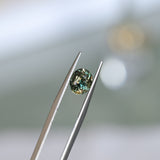 2.22CT OVAL MADAGASCAR SAPPHIRE, COLOR CHANGE OLIVE GREEN YELLOW TO PURPLE CHAMPAGNE, 7.59X6.31X5.45MM