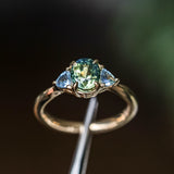 1.61ct Oval Madagascar Parti Sapphire and Trillion Sapphire Three Stone Low Profile Ring in 14k Yellow Gold