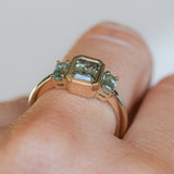 1.29ct Bezel Set Emerald Cut Untreated Montana Sapphire and Montana Sapphire Sides Three Stone Ring in 14k Yellow Gold