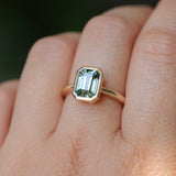 2.62ct Teal Green Emerald Cut Sapphire Low Profile Bezel Ring in 14k Yellow Gold