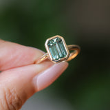 2.62ct Teal Green Emerald Cut Sapphire Low Profile Bezel Ring in 14k Yellow Gold