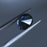 1.73CT PRECISION CUT OVAL MONTANA SAPPHIRE, DENIM PARTI TEAL WITH EARTHY INCLUSIONS, 7.47X6.16X4.69MM
