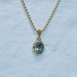 1.56ct Untreated Teal Green Nigerian Oval Sapphire 10 Prong Pendant in 14k Yellow Gold