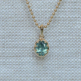 1.56ct Untreated Teal Green Nigerian Oval Sapphire 10 Prong Pendant in 14k Yellow Gold