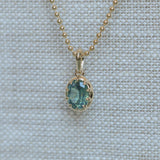 1.56ct Untreated Teal Green Nigerian Oval Sapphire 10 Prong Pendant in 14k Yellow Gold