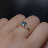 1.10ct Round Deep Teal Montana Sapphire and Princess Cut Diamond Rapids Low Profile Ring in 14k Yellow Gold