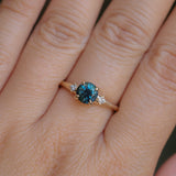 1.10ct Round Deep Teal Montana Sapphire and Princess Cut Diamond Rapids Low Profile Ring in 14k Yellow Gold