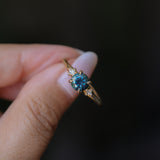 1.10ct Round Deep Teal Montana Sapphire and Princess Cut Diamond Rapids Low Profile Ring in 14k Yellow Gold