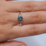 1.21ct Oval Blue Precision Cut Montana Sapphire Low Profile 4 Prong Leaf Bud Solitaire in 14k Yellow Gold