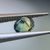 0.94CT ROUND MADAGASCAR SAPPHIRE, TEAL BLUE GREEN WITH GREY, 5.9X3.4MM