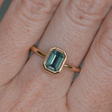 1.26ct Australian Untreated Emerald Cut Caribbean Teal Sapphire Low Profile Bezel Ring in 14k Yellow Gold