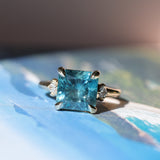 5.53ct Radant Cut Untreated Montana Sapphire and Princess Cut Diamond Rapids Low Profile Ring in 14k Yellow Gold