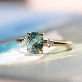 1.35ct Oval Brilliant Montana Sapphire and Princess Cut Diamond Rapids Low Profile Ring in 14k Yellow Gold