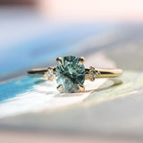 1.35ct Oval Brilliant Montana Sapphire and Princess Cut Diamond Rapids Low Profile Ring in 14k Yellow Gold