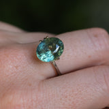 7.19CT OVAL MADAGASCAR SAPPHIRE, LIGHT-MEDIUM TEAL BLUE GREEN, 12.10X9.73X7.55MM - APPRAISED STONE