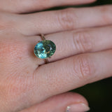 7.19CT OVAL MADAGASCAR SAPPHIRE, LIGHT-MEDIUM TEAL BLUE GREEN, 12.10X9.73X7.55MM - APPRAISED STONE