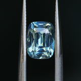 2.04CT ELONGATED CUSHION MADAGASCAR SAPPHIRE, PARTI LIGHT TEAL, UNTREATED, 7.6X5.6X4.7MM