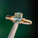 1.58ct Oval Untreated Light Blue Montana Sapphire Evergreen Carved 4 Prong Solitaire in 14k Yellow Gold