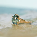 3.29ct Untreated Oval Parti Green Sapphire Low Profile 6 Prong Evergreen Carved Solitaire in 14k Yellow Gold