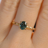 0.80ct Oval Precision Cut Blue Montana Sapphire Evergreen Carved 4 Prong Solitaire in 14k Yellow Gold