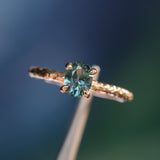 0.80ct Oval Precision Cut Blue Montana Sapphire Evergreen Carved 4 Prong Solitaire in 14k Yellow Gold