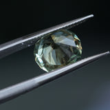 2.57CT FANCY PRECISION CUSHION MONTANA SAPPHIRE, PARTI OLIVE GREEN AND GOLD, 8.82X7.54X5.37MM - APPRAISED STONE