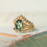 3.29ct Untreated Oval Parti Green Sapphire Low Profile 6 Prong Evergreen Carved Solitaire in 14k Yellow Gold