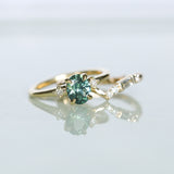 1.41ct Oval Teal Parti Montana Sapphire and Princess Cut Diamond Rapids Low Profile Ring in 18k Yellow Gold