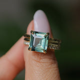 4.58ct Emerald Cut Teal Sapphire Triple Band with Diamonds and Evergreen Texture 4 Prong Low Profile Ring in 18k Yellow Gold