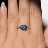 1.82ct Round Teal Precision Cut Montana Sapphire and Trillion Sapphire Low Profile Three Stone Ring in 18k Yellow Gold
