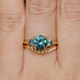 1.82ct Round Teal Precision Cut Montana Sapphire and Trillion Sapphire Low Profile Three Stone Ring in 18k Yellow Gold
