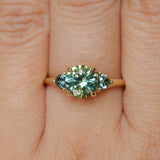1.50ct Round Parti Yellow Blue Precision Cut Montana Sapphire and Trillion Sapphire Low Profile Three Stone Ring in 18k Yellow Gold