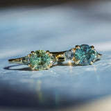 1.82ct Round Teal Precision Cut Montana Sapphire and Trillion Sapphire Low Profile Three Stone Ring in 18k Yellow Gold