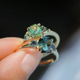 1.82ct Round Teal Precision Cut Montana Sapphire and Trillion Sapphire Low Profile Three Stone Ring in 18k Yellow Gold