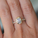 2.10ct Untreated Opalescent Radiant Cut Sapphire Low Profile Bezel Solitaire Ring with Pavé Set Diamonds in 14k Yellow Gold
