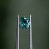 1.30CT PRECISION CUT OVAL MONTANA SAPPHIRE, CARIBBEAN TEAL, 6.8X5.6X4.2MM