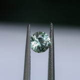 1.06CT ROUND MONTANA SAPPHIRE, LIGHT PARTI YELLOW BLUE, UNTREATED, 6.1X4MM