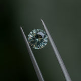 1.06CT ROUND MONTANA SAPPHIRE, LIGHT PARTI YELLOW BLUE, UNTREATED, 6.1X4MM