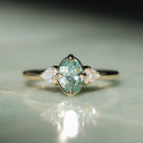 0.73ct Oval Unheated Montana Sapphire and Trillion Diamond Low Profile Ring in 14k Yellow Gold