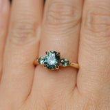 1.51ct Oval Teal Blue Precision Cut Montana Sapphire and Pear Sapphire Low Profile Three Stone Ring in 14k Yellow Gold