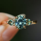 1.51ct Oval Teal Blue Precision Cut Montana Sapphire and Pear Sapphire Low Profile Three Stone Ring in 14k Yellow Gold