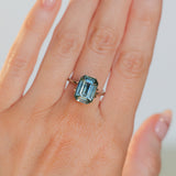 6.91CT UNTREATED EMERALD CUT MADAGASCAR SAPPHIRE, AQUA BLUE GREEN-GREY, 12.1X8.6X6.3MM